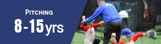 players practicing pitching with guidance from expert baseball coach