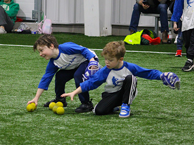 kids practicing fielding balls